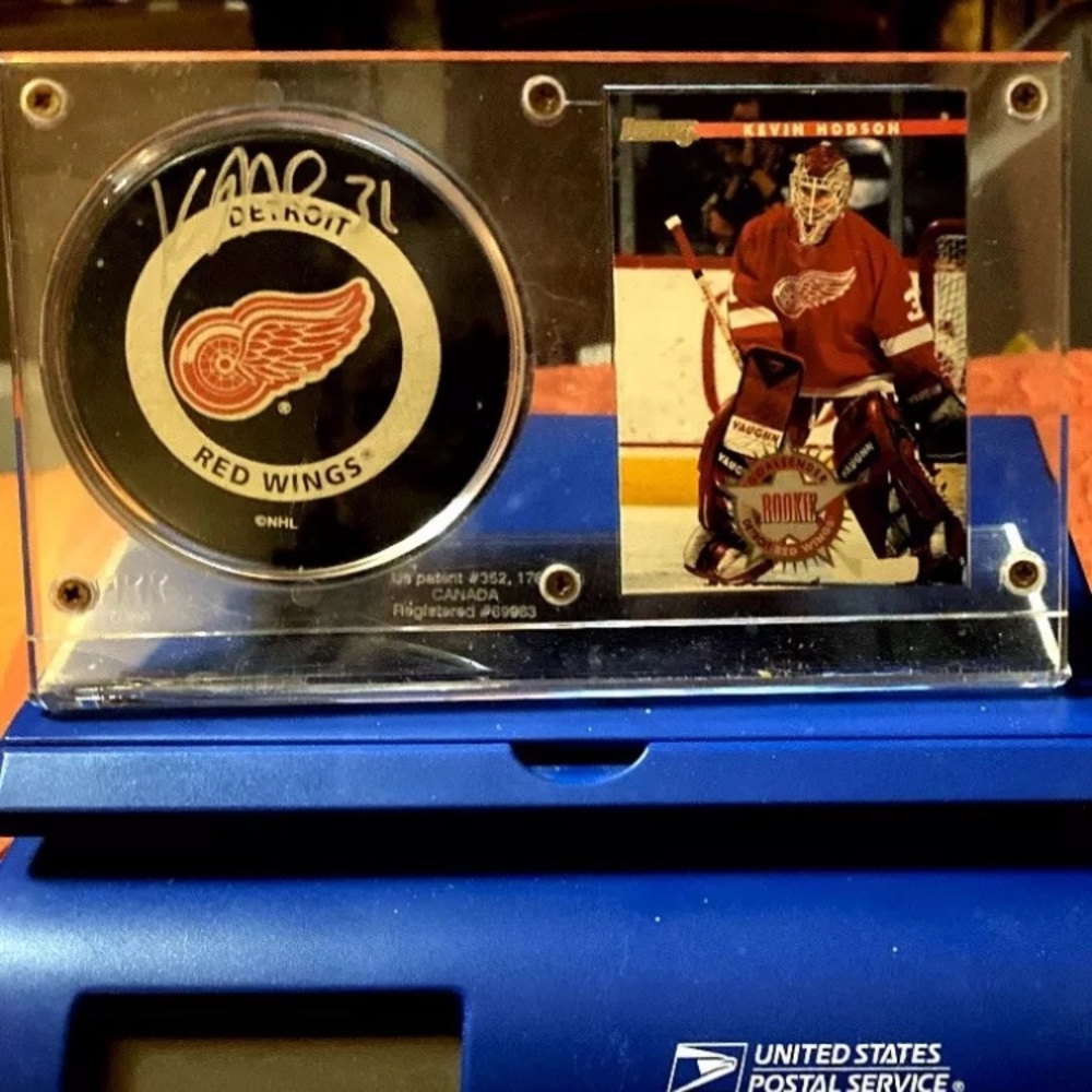 Detroit Red Wings Kevin Hodson“ Game Used” Hockey Puck and Rookie Card Display.